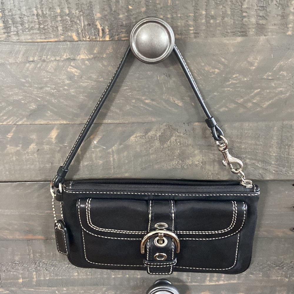 Coach wristlet in black leather